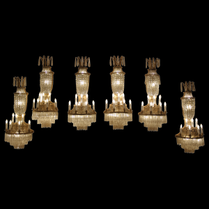 Set of six French gilt brass & rock crystal 11 light wall lights